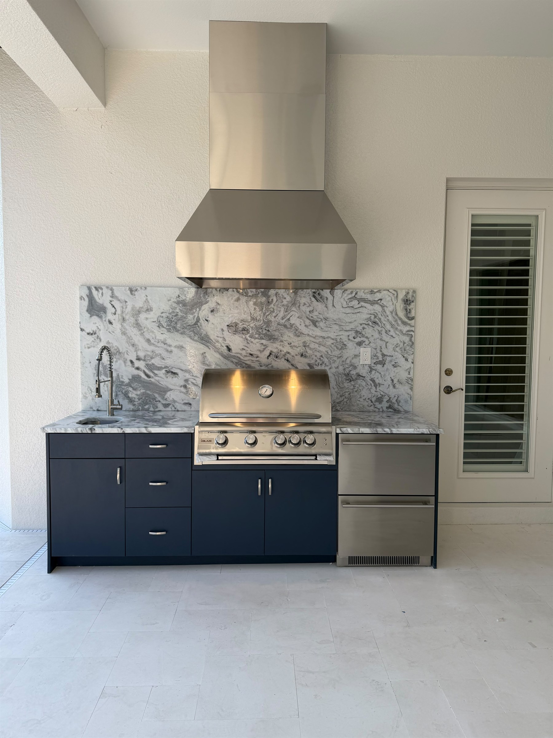 Indigo Blue outdoor kitchen with Flat Panel door style, front view